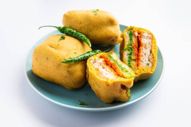 Ulta Vada Pav is made with a spicy potato stuffed bun, called pav inside vada, inside out wada pao