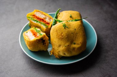 Ulta Vada Pav is made with a spicy potato stuffed bun, called pav inside vada, inside out wada pao