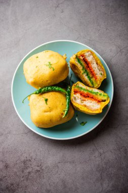 Ulta Vada Pav is made with a spicy potato stuffed bun, called pav inside vada, inside out wada pao