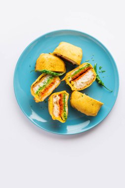 Ulta Vada Pav is made with a spicy potato stuffed bun, called pav inside vada, inside out wada pao