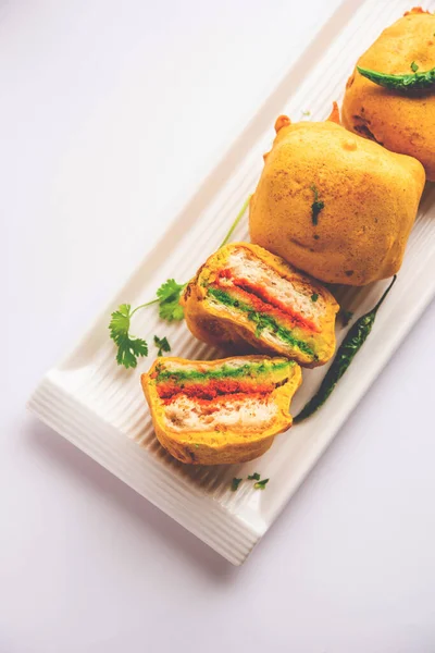 Ulta Vada Pav is made with a spicy potato stuffed bun, called pav inside vada, inside out wada pao