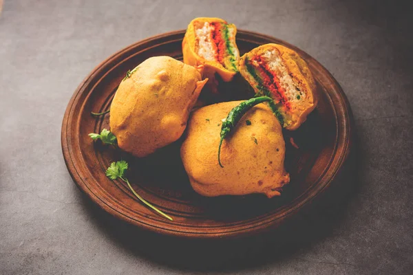 Ulta Vada Pav is made with a spicy potato stuffed bun, called pav inside vada, inside out wada pao