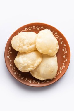 Luchi or Lusi is a deep-fried poori or flatbread, made of Maida flour, originating from Bengal