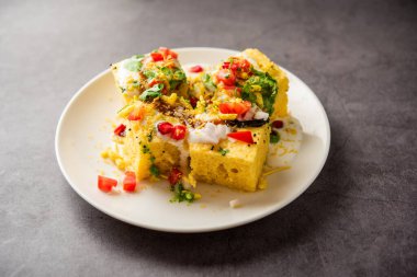 Khaman Dhokla chaat is a very simple and refreshing fusion chaat recipe made using leftover dhokla