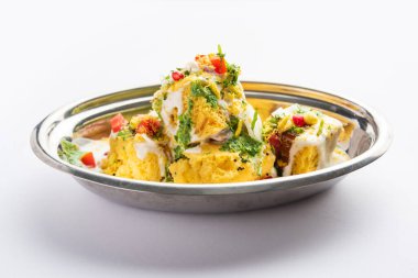 Khaman Dhokla chaat is a very simple and refreshing fusion chaat recipe made using leftover dhokla