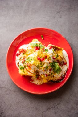 Khaman Dhokla chaat is a very simple and refreshing fusion chaat recipe made using leftover dhokla
