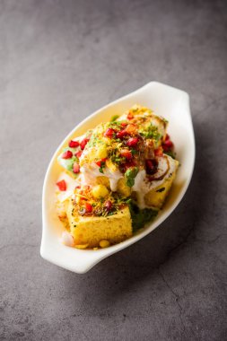 Khaman Dhokla chaat is a very simple and refreshing fusion chaat recipe made using leftover dhokla
