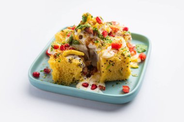 Khaman Dhokla chaat is a very simple and refreshing fusion chaat recipe made using leftover dhokla