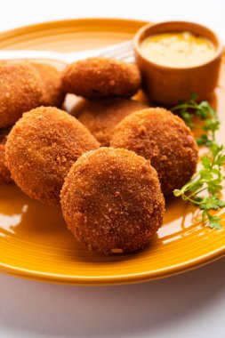 Macher Chop - Bengali style fish cutlet or pakora, a popular festival snack from west Bengal