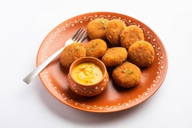 Macher Chop - Bengali style fish cutlet or pakora, a popular festival snack from west Bengal