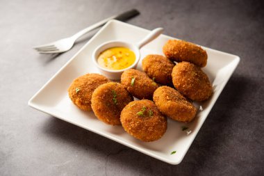 Macher Chop - Bengali style fish cutlet or pakora, a popular festival snack from west Bengal
