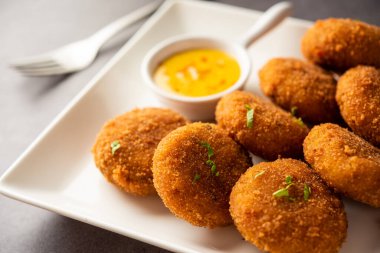 Macher Chop - Bengali style fish cutlet or pakora, a popular festival snack from west Bengal