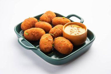 Macher Chop - Bengali style fish cutlet or pakora, a popular festival snack from west Bengal