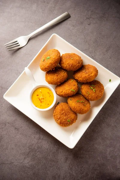Macher Chop - Bengali style fish cutlet or pakora, a popular festival snack from west Bengal