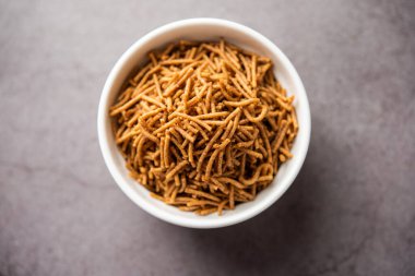 Nachni ya da Ragi Sev parmak değirmenlerinden yapılan lezzetli bir çıtır eriştedir, sağlıklı Hint yemeğidir.