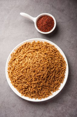 Nachni ya da Ragi Sev parmak değirmenlerinden yapılan lezzetli bir çıtır eriştedir, sağlıklı Hint yemeğidir.