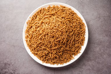 Nachni ya da Ragi Sev parmak değirmenlerinden yapılan lezzetli bir çıtır eriştedir, sağlıklı Hint yemeğidir.