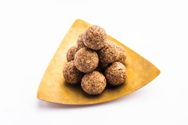 Alsi pinni laddu ya da keten tohumu laddo veya sağlıklı jawa ladoo Hint tatlı enerji toplarıdır.