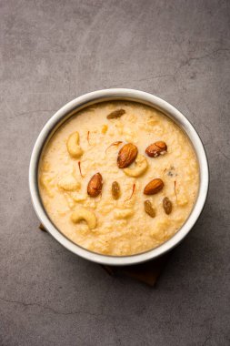 Nolen Gurer Chanar Payesh ya da süzme peynirli sütlü puding, pilav ve jaggery, bengali tatlı tarifi