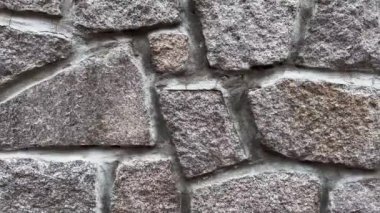 Koyu gri taş duvar dokusunun ön görüntüsü