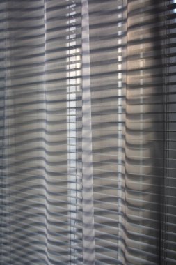 Perde arkaplanındaki gölgeler (jalousie)