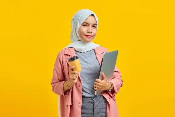 Portrait Smilling Young Asian Woman Holding Laptop Coffee Isolated Yellow — Stock Photo, Image