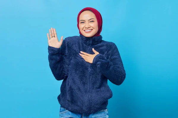 Portrait Smiling Young Asian Woman Swearing Hands Chest Open Palms — Stock Photo, Image