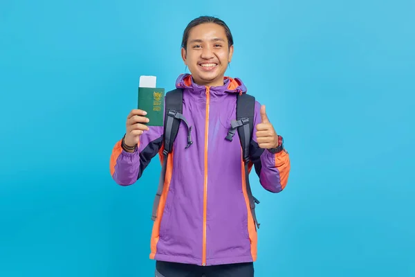 Portrait Cheerful Asian Young Man Showing Passport Book Giving Thumbs — Stockfoto