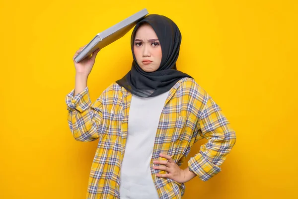 Pensive Young Asian Muslim Student Holding Book Head Looks Seriously — Photo