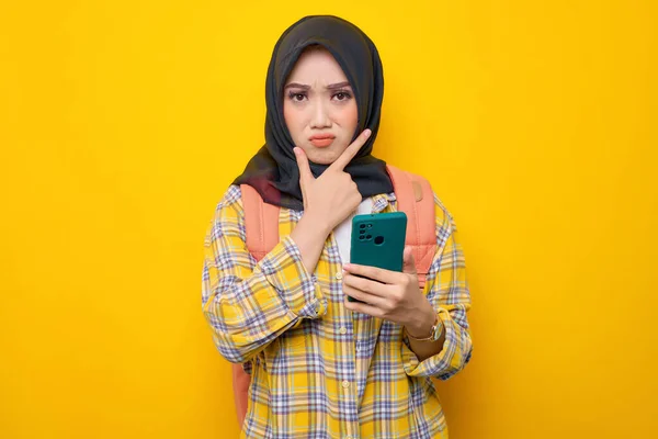 Pensive Young Asian Muslim Woman Student Plaid Shirt Backpack Using — ストック写真