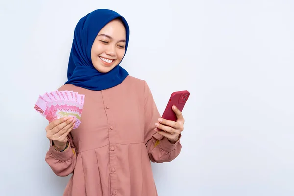 Smiling Young Asian Muslim Woman Pink Shirt Using Mobile Phone — Stock Fotó