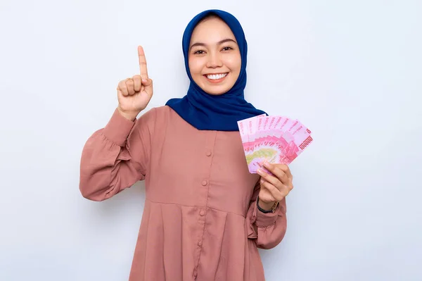 Cheerful Young Asian Muslim Woman Pink Shirt Holding Money Banknotes — Stok Foto