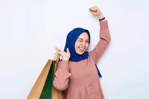 Excited Young Asian Muslim Woman Pink Shirt Holding Package Bags — Stok Foto