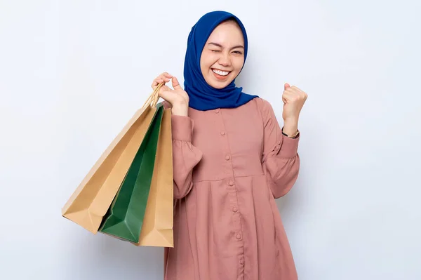Excited Young Asian Muslim Woman Pink Shirt Holding Package Bags — Stock Fotó