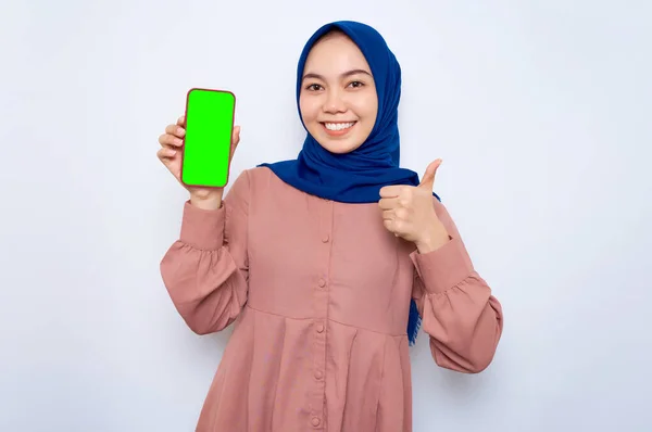 Cheerful Young Asian Muslim Woman Pink Shirt Showing Mobile Phone — стоковое фото
