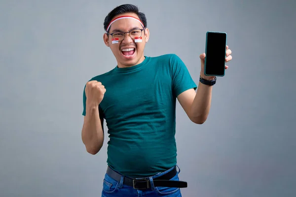 Excited Young Asian Man Casual Shirt Showing Mobile Phone Blank — Φωτογραφία Αρχείου