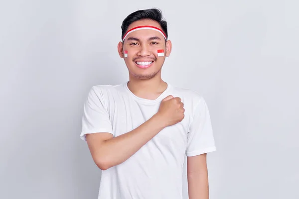 Portrait Smiling Young Asian Man Showing Respect Gesture Hand Chest — Foto Stock