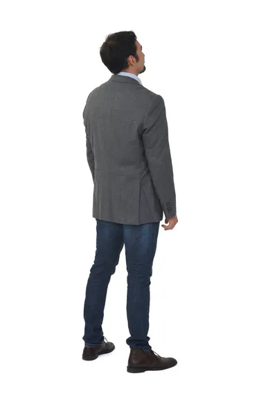 Rückansicht Eines Mannes Mit Blazer Und Jeans Auf Weißem Hintergrund — Stockfoto