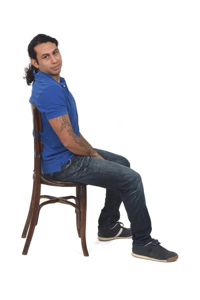 Side View Man Ponytail Casual Clothing Sitting Chair Looking Camera — Stockfoto