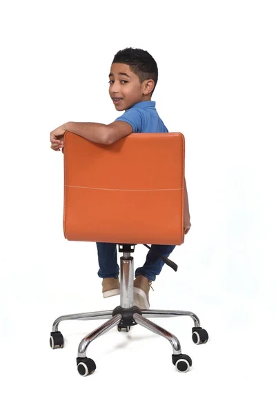 Rear View Boy Who Sitting Chair Turns White Background — Stock Photo, Image