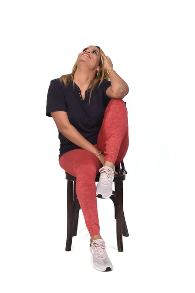 Front View Woman Dressed Sportswear Sitting Chair Looking White Background — 스톡 사진