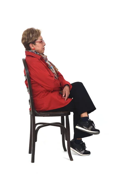 Side View Full Portrait Serious Senior Woman Shirt Pants Sitting — 스톡 사진