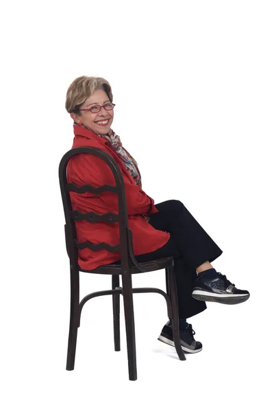 Senior Woman Turning Chair White Background — 스톡 사진