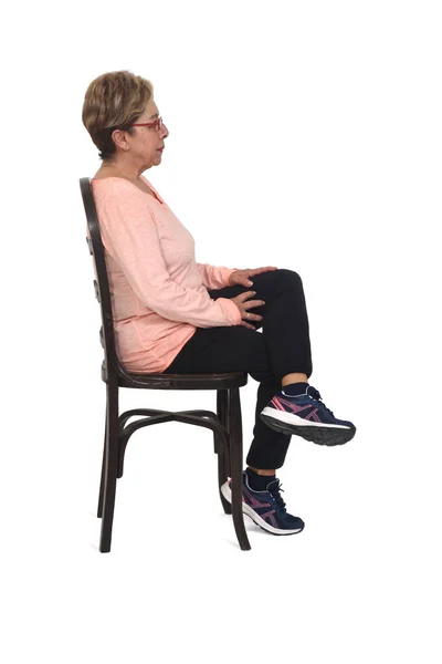 Side View Full Portrait Senior Woman Sitting Chair Dressed Sportswear — Zdjęcie stockowe