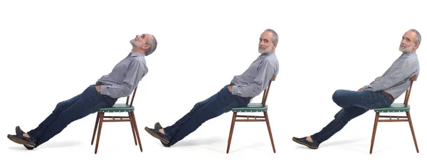 Vista Lateral Mesmo Homem Sentado Cadeira Fundo Branco — Fotografia de Stock
