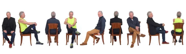 Large Group Same Men Various Outfits Sitting Chair White Background — Fotografia de Stock