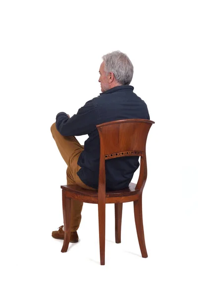 Rear Side View Man Sitting Chair Legs Crossed White Background — Stockfoto
