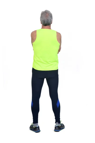 Back View Man Sportswear Tights Fluorescent Yellow Arms Crossed White — Zdjęcie stockowe