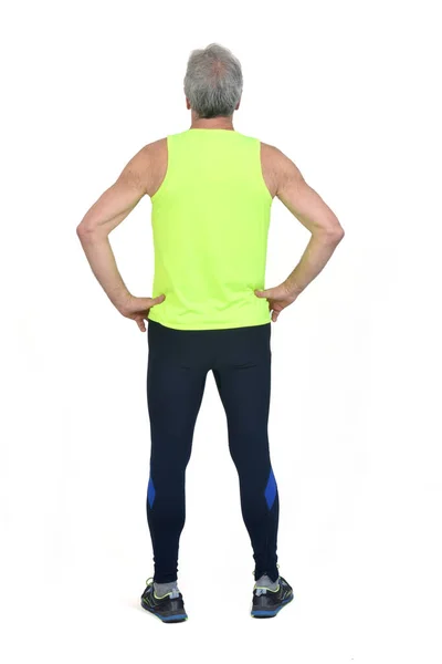 Back View Man Sportswear Tights Fluorescent Yellow Hands Hip White — Foto de Stock