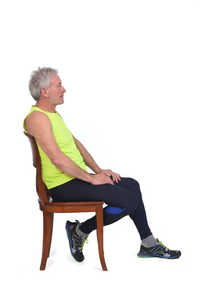 Side View Man Sportswear Tights Fluorescent Yellow Sleeveless Sitting Chair — Zdjęcie stockowe